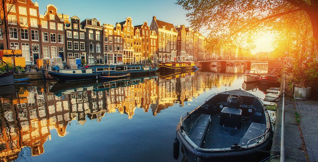 Stroll along the famous canals of Amsterdam